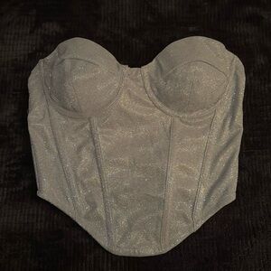 Sparkly silver corset.
